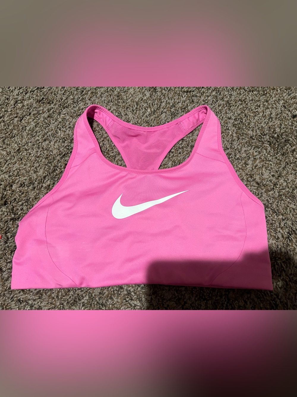 Nike Pink Racerback sports bra with White Swoosh